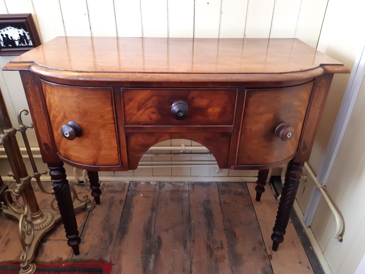 Early Victorian mahogany bow-front sideboard